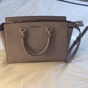 Michael Korrs, ,new, never used tag detached elephant color ,shoulder or arm bag